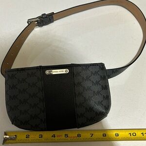 Michael Kors Fanny Pack size small with adjustable belt.